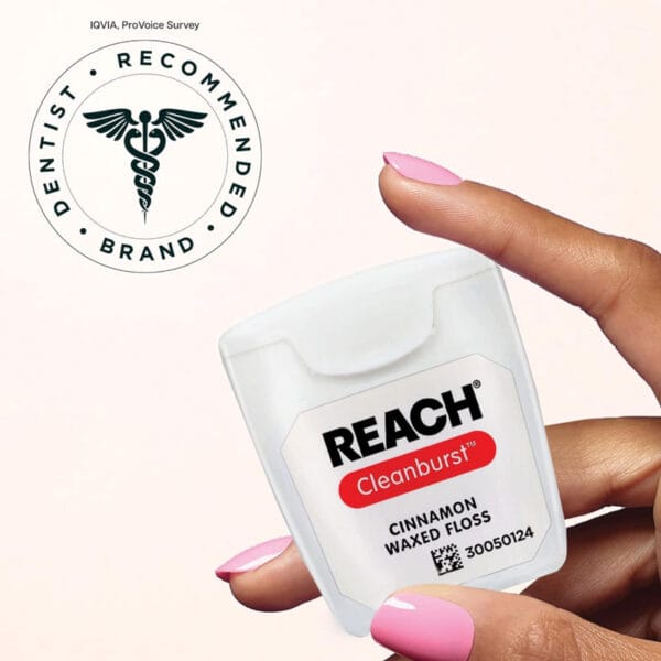 REACH waxed dental floss cinnamon flavor - 50m vegan dental floss with high tensile strength and up to 52% more plaque removal. Picture Dentist Recommended seal.