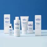 Dr. Belmeur Spot Care Ampoule 22ml - soothing serum with panthenol, beta-glucan, chaga mushroom and tea tree oil against blemishes and redness. Shown with other Dr. Belmeur products. 