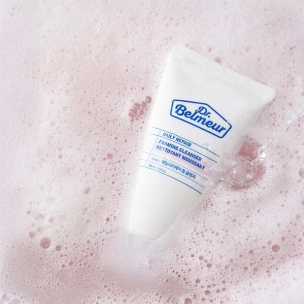 Dr. Belmeur Daily Repair Foaming Cleanser 150ml - mild pH-balanced foaming cleanser with birch extract and panthenol for sensitive skin. Picture Cleanser in a foam bath. 