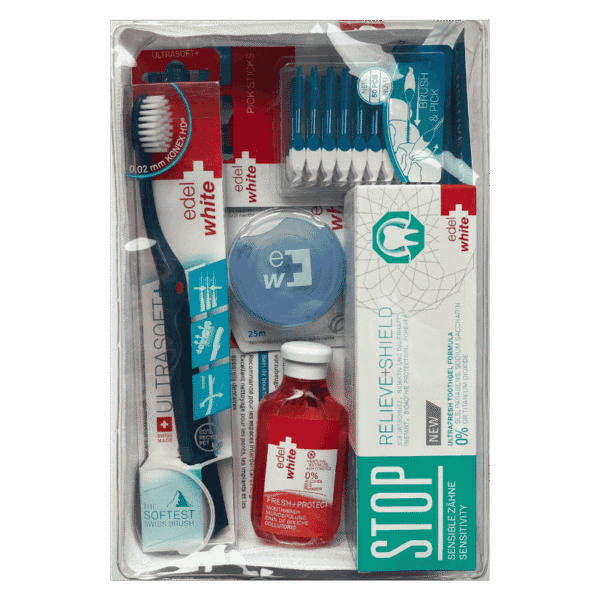 Set edel+white Sensitive Care. Photo du contenu du set, brosse à dents, fil dentaire, gel dentaire, brossettes interdentaires et bain de bouche pour dents sensibles et gencives irritées 