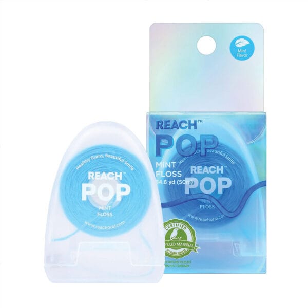 REACH POP Zahnseide Minze – vegane, gewachste Zahnseide mit 384 Mikrofäden & nachhaltiger Verpackung, 50m. Abbildung Produkt mit Verpackung.